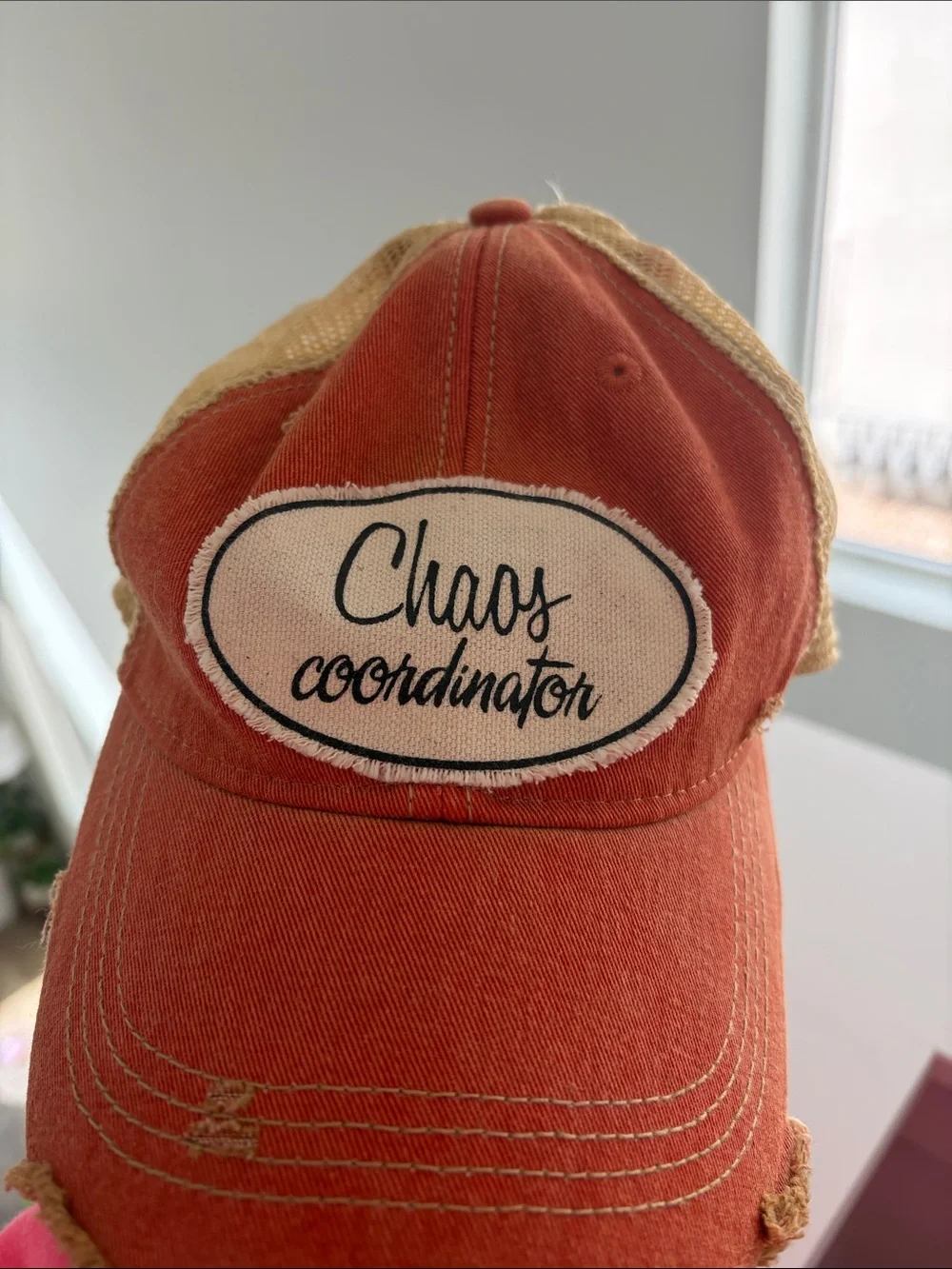 Chaos Coordinator Orange Mesh Trucker Hat